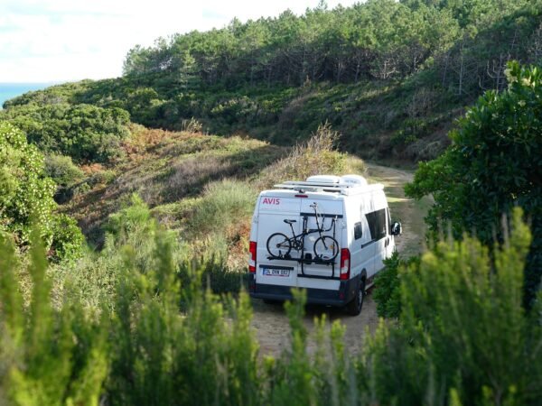 Camper van with a rear module